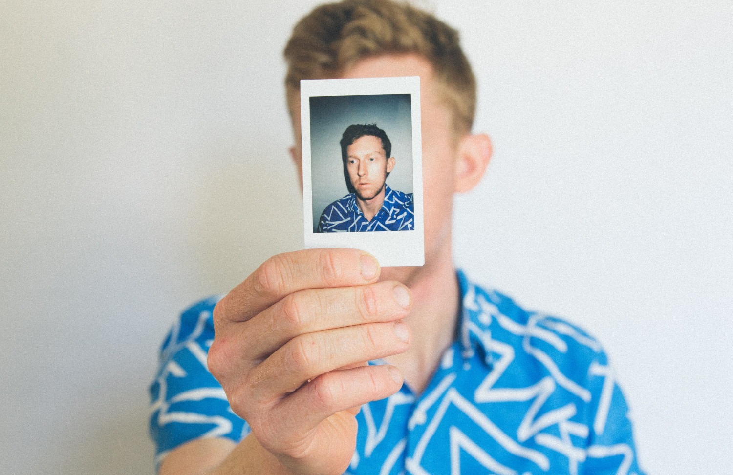 can you smile in a passport photo